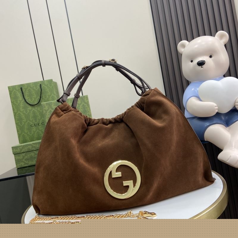 G*u*i top handle bags